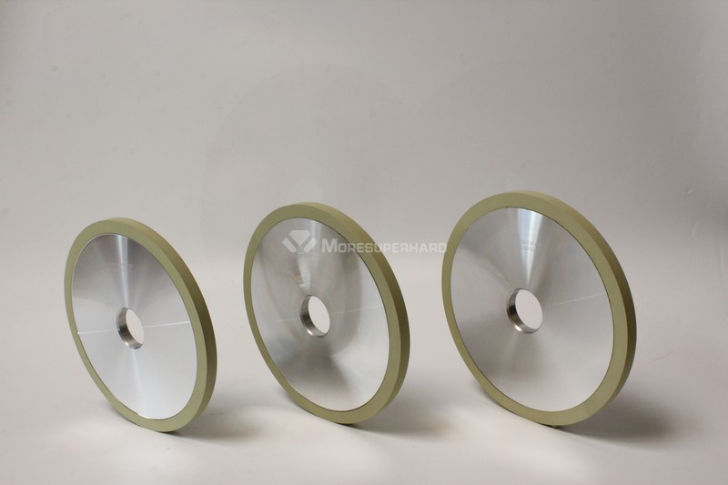 Ceramic diamond bruting wheels for natural diamond polishing